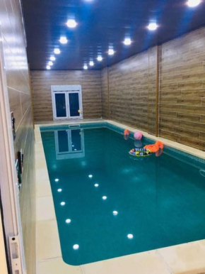 Villa avec piscine, jardin et barbecue
